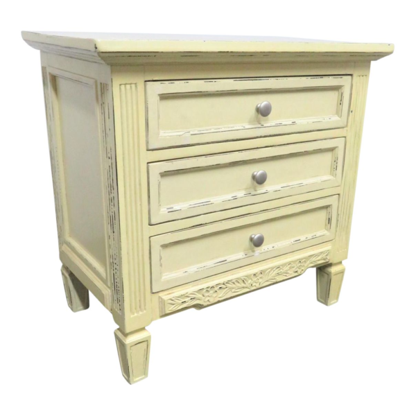 Vintage cream wood nightstand with three drawers and floral details