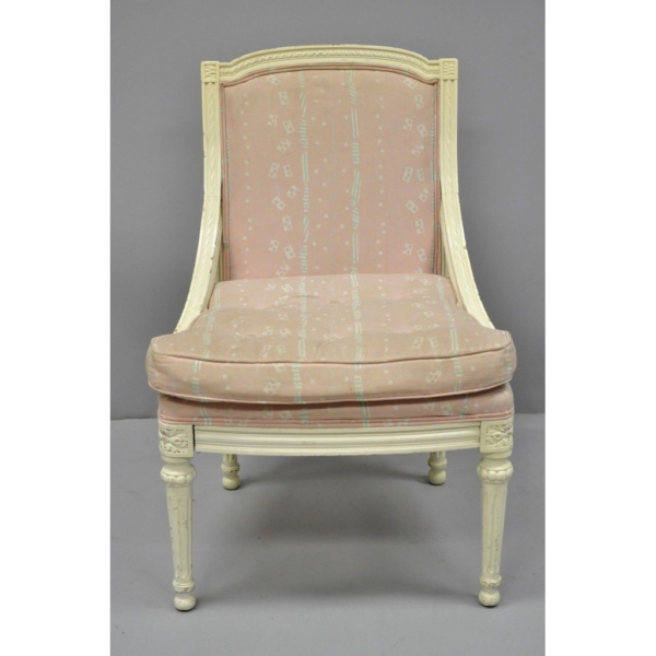 Vintage dining chair with wood frame and pink cushion